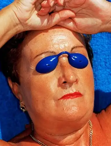 Vibrant satirical photography by Martin Parr exploring global tourism and consumerism at the Jeu de Paume gallery.